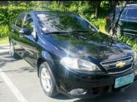 Black Chevrolet Optra 2008 at 70000 km for sale