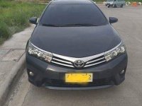 Selling Black Toyota Corolla Altis 2014 