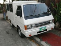 Sell White 2013 Mitsubishi L300 in Quezon City