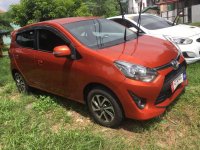 Orange Toyota Wigo 2018 for sale in Cainta