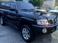 Selling Black Nissan Patrol 2010 Automatic Diesel at 80000 km