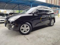 Selling Black Hyundai Tucson 2012 Automatic Gasoline at 57000 km