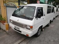 Selling White Mitsubishi L300 2014 in Quezon City