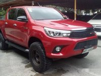 Red Toyota Hilux 2016 at 20000 km for sale