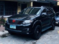 Selling Black Toyota Fortuner 2012 in Quezon City