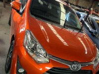 Selling Orange Toyota Wigo 2019 in Quezon City