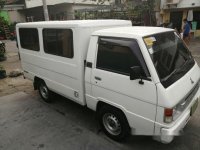 Selling White Mitsubishi L300 2013 in Quezon City