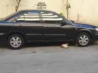 Sell Black 2002 Nissan Exalta in Quezon City