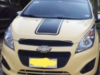 Selling Cream Chevrolet Spark 2014 in Pili