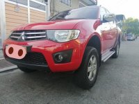 Sell Red 2013 Mitsubishi Strada in Quezon City 