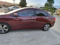 Red Honda City 2015 at 27000 km for sale 