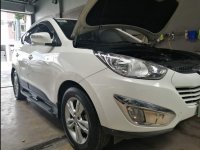 Selling White Hyundai Tucson 2012 in Malolos