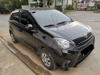 Selling Black Toyota Wigo 2016 in Manila