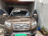 Selling Brown Hyundai Santa Fe 2012 in Quezon City