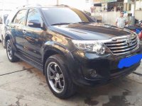 Selling Black Toyota Fortuner 2012 at 74000 km 