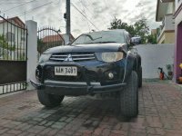 Sell Black 2012 Mitsubishi Strada in Bamban