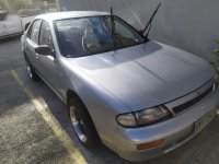 Silver Nissan Almera for sale in Manila