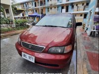 Selling Red Honda Odyssey in Rodriguez