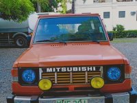 Selling Orange Mitsubishi Pajero for sale in Bustos
