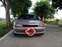 Selling Beige Mitsubishi Lancer for sale in Rizal