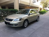 Selling Beige Mitsubishi Lancer for sale in Manila