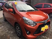 Selling Orange Toyota Wigo in Dasmariñas