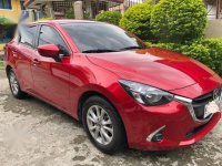 Red Mazda 2 for sale in Pacita Complex