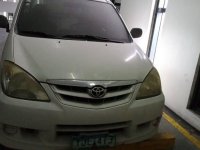 White Toyota Avanza 2010 for sale in Quezon City