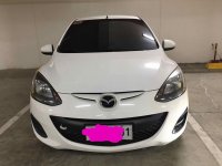 Selling White Mazda 2 in Manila
