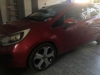 Selling Red Kia Rio in Angeles