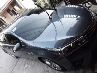 Sell Black Toyota Corolla altis in Quezon City