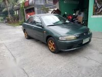 Green Mazda 323 for sale in Bulacan