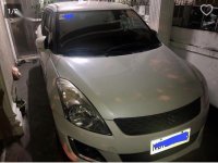 Selling Pearl White Suzuki Swift in Quezon City