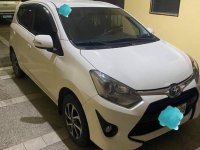 Pearl White Toyota Wigo for sale in Quezon 