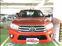 Orange Toyota Hilux 2018 at 27364 km for sale in Manila