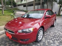Red Mitsubishi Lancer 2013 for sale in Quezon City