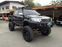 Selling Black Toyota Hilux 2012 in Mandaue