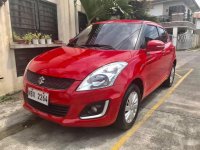 Red 2016 Suzuki Swift Hatchback