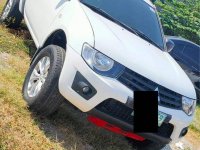 Selling Mitsubishi Strada 2011 