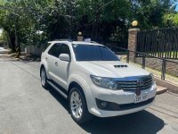 Selling Pearl White Toyota Fortuner 2014 in Makati