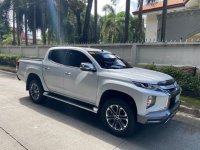 Selling Pearl White Mitsubishi Strada 2019 in Pasig