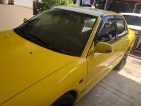 Yellow Mitsubishi Lancer 1994 for sale in Pateros