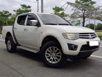 Selling White Mitsubishi Strada 2012 in Makati