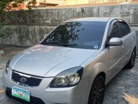 Selling Brightsilver Kia Rio 2011 in Obando