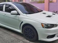 Pearl White Mitsubishi Lancer 2010 for sale in Quezon City