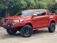 Selling Orange Toyota Hilux 2017 in Quezon City