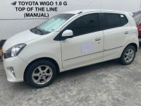 Selling White Toyota Wigo 2017 in Makati