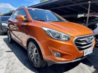 Orange Hyundai Tucson 2014 for sale in Automatic