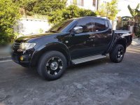 Selling Black Mitsubishi Strada 2012 in Marikina