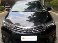 Selling Black Toyota Corolla Altis 2016 in San Juan